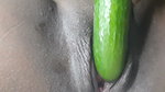 Petty girl playing with Gherkin