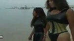 2 sexy Latina’s presenting latex fetish in the pool and on the beach