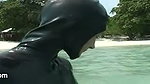 Girls in latex on the beach
