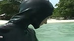 Swimming in the ocean with ebony babe
