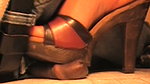 A girl tramples a guy s genitals with her massive heels