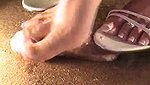 Cock trampling in sandals