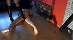 Dominatrix Nika Stands with her Heels on the Balls of a Slave Trampling Balls BDSM Practice
