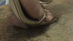 Girl massages guy s penis with shoes