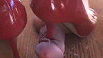 Girl mercilessly tramples guy s genitals with red shoes