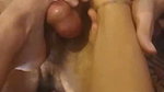 Girl presses balls while guy jerks off