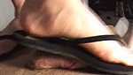 Girl tramples guy s dick with flip flops