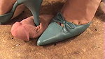 Girl tramples guy s genitals with grey shoes