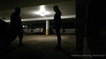 Right in the parking lot a girl punishes a guy in the balls