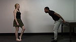 The girl beats the guy s balls like a punching bag