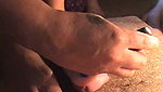 The guy loves trampling his dick with feet