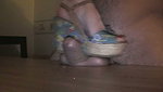 The guy s penis got hard while the girl was trampling it with her feet