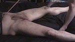 The guy spread his legs so that the girl could punish his genitals
