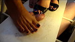 Two beauties trample a guy s balls with their feet