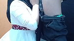 A Lonely Woman Wearing a Hijab in a Boarding