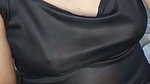 Atiqah plays with her breasts while wearing lotion