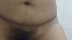 Busty widow colmek and shows off big breasts in the bathroom