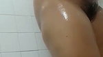 Compilation of videos of Indonesian mother-in-law taking a shower showing off her plump body