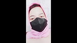 hijab woman playing with dildo in room