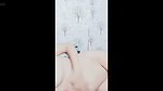 hijab woman playing with dildo in room