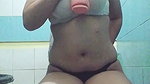 Horny chick plays with dildo