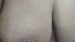 Lonely widow shows off her breasts before taking a shower