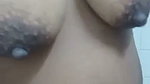 Lonely widow shows off her breasts before taking a shower
