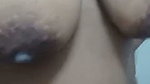 Lonely widow shows off her breasts before taking a shower