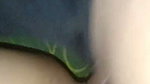 On the other side of the pond is a crocodile in the middle of the pond