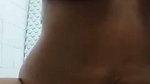 Sexy stepmom takes a shower while cumming in the bathroom