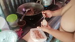 Stripping mother-in-law who is cooking