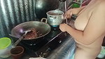 Stripping mother-in-law who is cooking