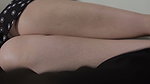 wearing a beautiful dress, masturbating while showing off her vagina