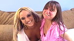 Brunette mature seducing tattooed babe’s pussy at casting