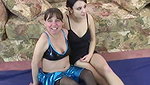Cute lesbian gets fucked by a midget with a strap-on