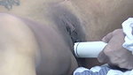 Erotic babe fucking her partner with a dildo on th bed in a lesbian session
