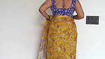 Chubby desi lady deep navel in yellow saree 1