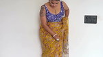Chubby desi lady deep navel in yellow saree 1