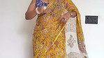 Chubby desi lady deep navel in yellow saree 1