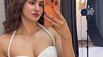 Sakshimalik flaunting her assets in sexy outfit