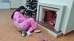 Dirty milf fingers herself with a butt plug in front of the fireplace