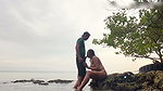 Hot pregnant woman enjoys an intense on the beach