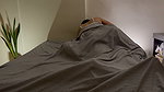 Under the sheets where kisses become secrets and touch says it all