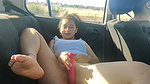 Outdoor public masturbation in a car while driving