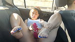 Outdoor public masturbation in a car while driving