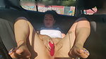Outdoor public masturbation in a car while driving