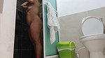 Young naked woman recorded in shower