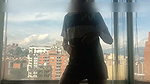 Dancing at the window in full view of the neighbors