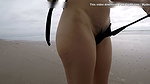 Walking on the beach micro bikini flash hairy pussy