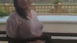 Desi Bhabhi in REsort Dancing in Rain showing her boobs